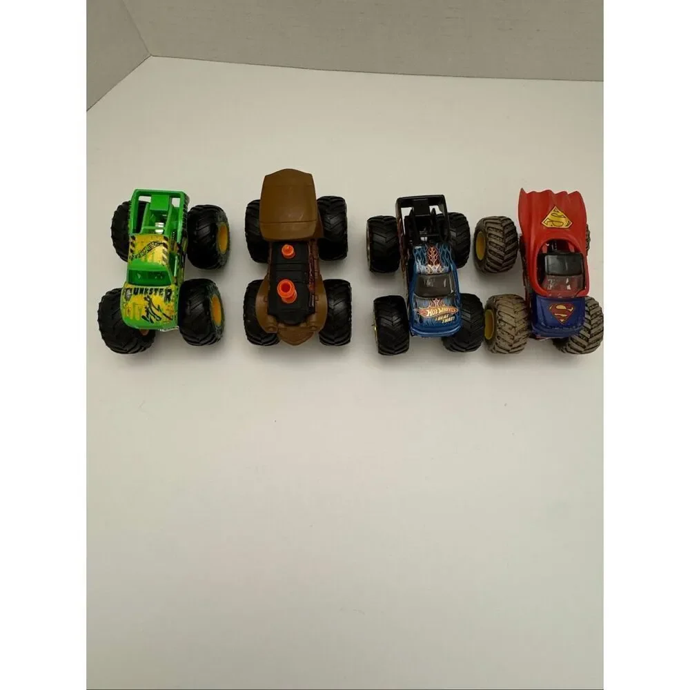 Hot Wheels Monster Trucks Set of 4 Loco Punk Superman Gunkster Beat That